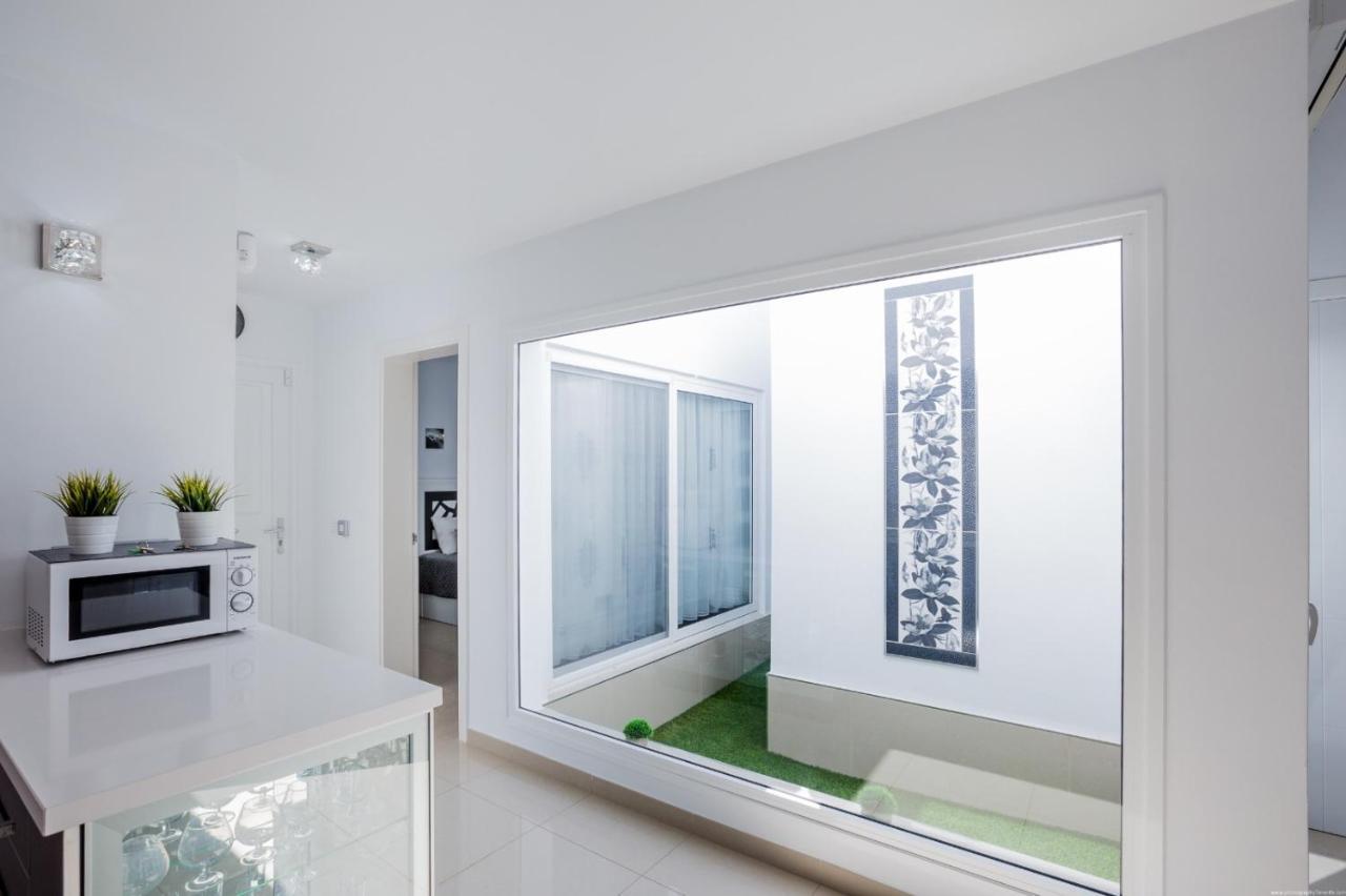 Island Village Prime Suite 312 阿德耶 外观 照片